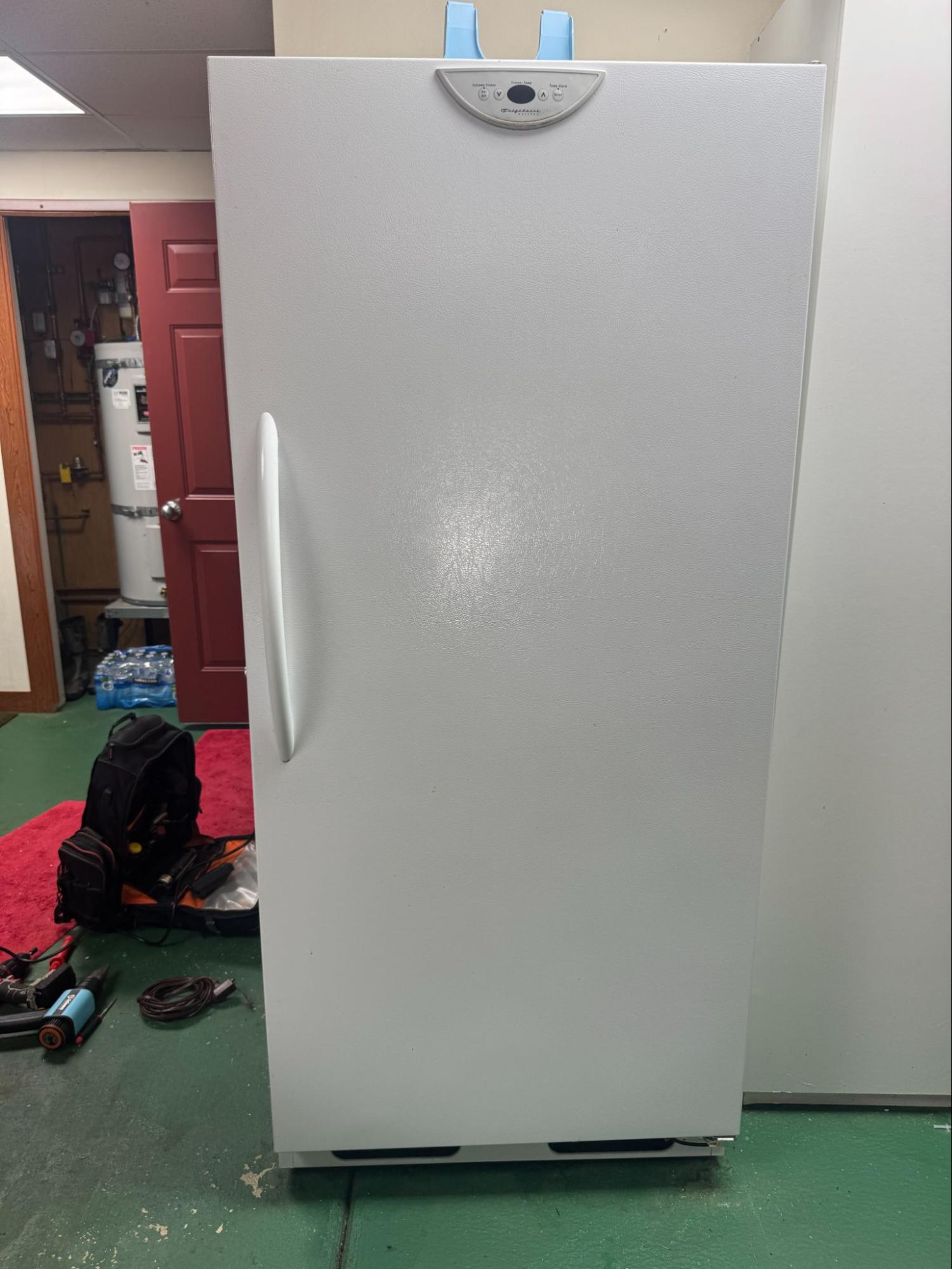 Frigidaire freezer inspected for a failed control board, torn gasket, and frost buildup in Hillsboro, Oregon