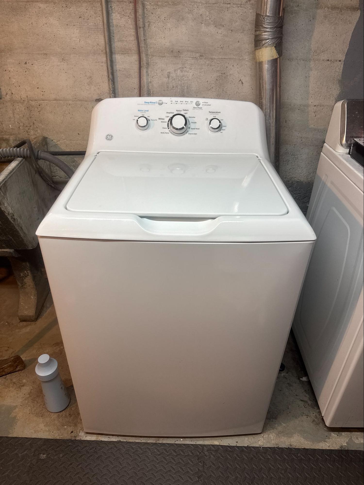 GE top-load washer diagnosed with a stretched motor belt in Happy Valley, Oregon