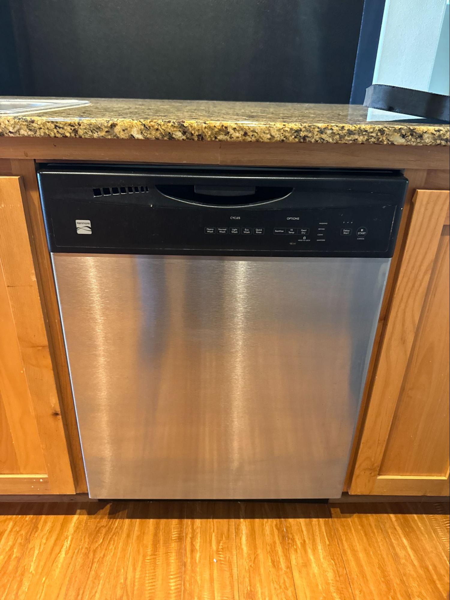Dishwasher inspected for a door-closing problem during a Lake Oswego service visit
